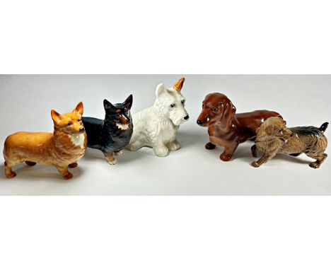 Four Beswick models of dogs to include a white Scotty dog, Dachshund, Corgi, etc, together with a Royal Doulton example (5)