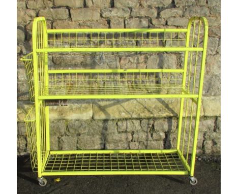 A three tier painted light metal trolley 