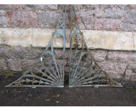 A pair of reclaimed 19th century cast bronze architectural brackets with trailing harebell and further decorative detail, 75 