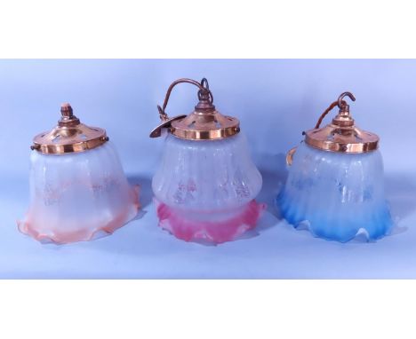 Four slightly different Christopher Way crimped glass light shades, light blue, two pink and amber, all with brass fittings, 