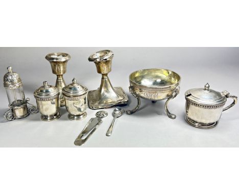 A mixed selection of silver, including condiments, two squat candlesticks, a page marker and a condiments silver bowl on pad 