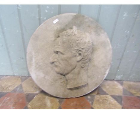 A cast composition stone wall mounted circular  plaque/roundel with raised profile/bust of a  Roman emperor, 46 cm diameter (