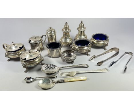 A six piece silver Georgian style condiment set with lion mask detail raised on paw feet, London, 1955, maker John Charles Lo