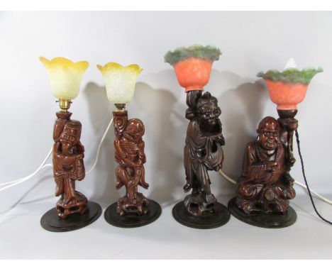 Seven Chinese root carved table lamp figures,  Fisherman, Laughing Buddha, an  Immortal, and  Merchant, and two birds, each w