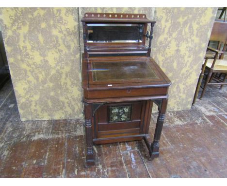 A Victorian mahogany Davenport in the aesthetic style with painted floral and bird detail, further gilt lined bands, and rais