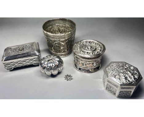 A mixed selection of Thai silver, including two Betel boxes, a beaker, a gourd shaped trinket box,  and a fine wirework box. 