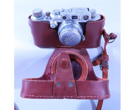 Photography Interest - A Leica camera model II number 165846, 1935, together with leather case