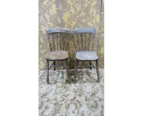 A pair of Windsor stained elm and beechwood stick back kitchen chairs on turned supports 