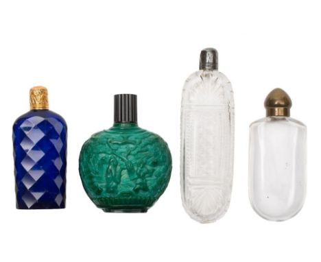 A late 18th Century English faceted blue glass scent bottle with gold screw cover: together with three other glass scent and 