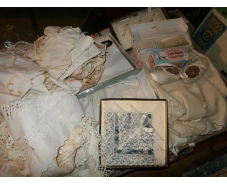 Box of linen inc petticoats and vintage baby items