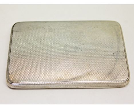 An Art Deco hallmarked silver slide open cigarette case having gilt interior, 11cm x 8cm, wt. 6oz.