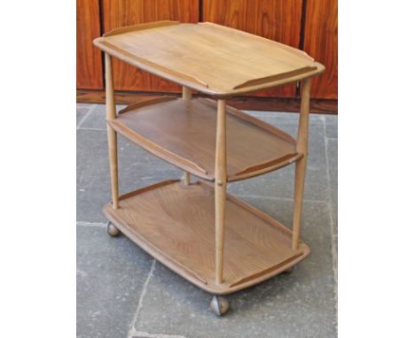 An Ercol light elm and beech three tier trolley. L72cm D46cm H74cm.