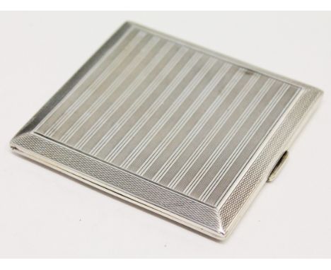 An Art Deco hallmarked silver cigarette case, 9cm x 8.5cm, wt. 4oz.