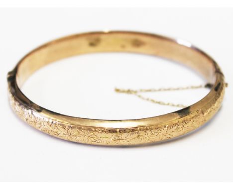 A 9ct gold bangle, diam. 6cm, wt. 10g.