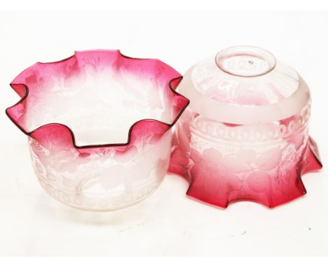 A pair of ruby and etched glass light shades, height 13cm. Condition - minor chips to fitting rim on one shade, otherwise ok.