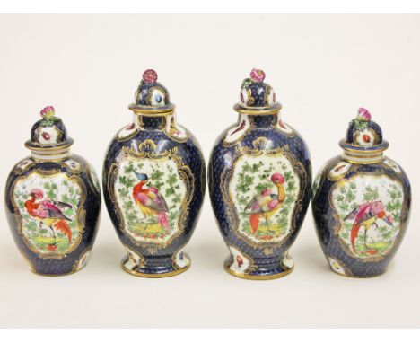A group of four 19th Century Worcester style porcelain vases and covers probably by Samson, height 14cm & 18cm. Condition - t