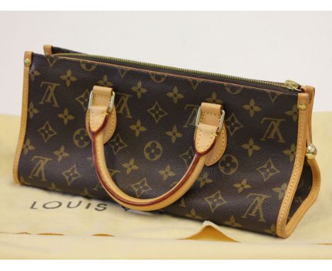 A Louis Vuitton leather handbag, length 30cm. Condition - appears unused.
