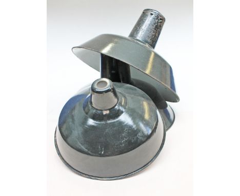 A group pf three industrial metal light shades. 
