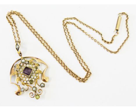 An Edwardian Art Nouveau 9ct gold pendant, length 4cm, on 9ct gold chain, gross wt. 5.5g.