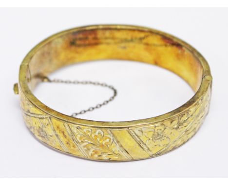 A hallmarked silver gilt bangle, diam. 6.5cm.