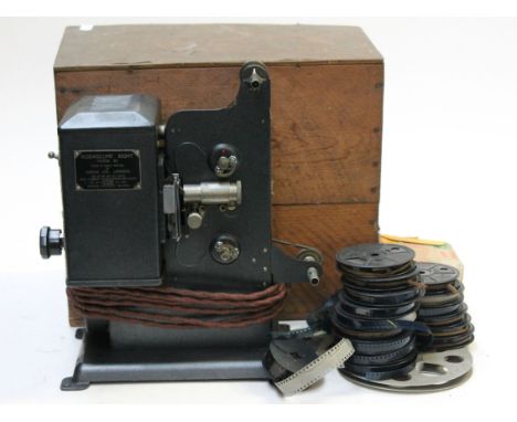 A Kodascope Eight Model 30 with various reels. Condition - projector appears ok, films not so good.