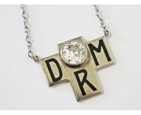 An Art Deco 18ct white gold single stone diamond pendant initialed 'DRM' on white metal chain, the diamond approx. 0.50 carat