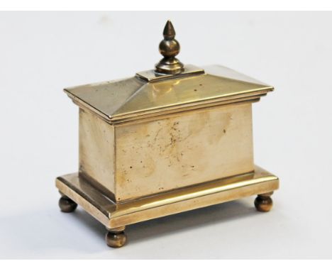 A 19th Century lead lined brass tea caddy of sarcophagus form, length 11cm. Condition - general wear only, no damage/repair.