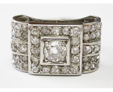 An Art Deco white metal diamond ring, the centre stone approx. 0.50 carats, total diamond approx. wt. 1.50 carats, gross wt. 