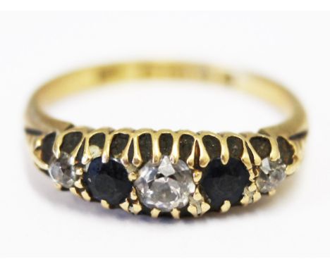 An 18ct gold diamond and sapphire ring, gross wt. 3.6g, size M.