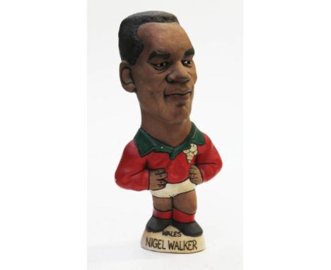 A Groggs ceramic figure of Nigel Walker, height 24cm. Condition - good, general wear.