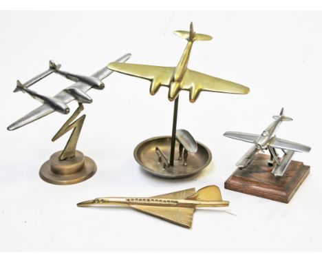 A group of four Art Deco style planes, three on plinths, tallest 16cm. Condition - general wear.