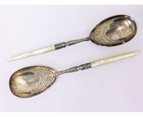 A pair of modernist silver plated serving spoons with mother of pearl handles, length 23.5cm each.