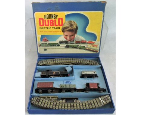 A Hornby Dublo electric train set complete with track, engine and four items of rolling stock in original box no. EDG17. 