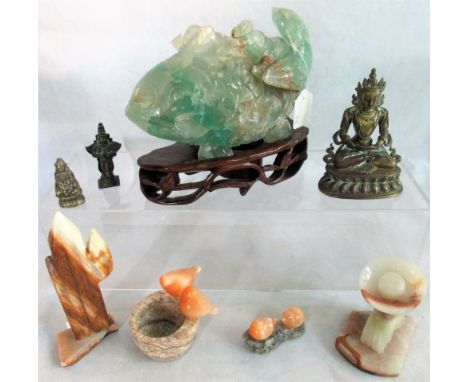 A large jade carving of a fish on wooden stand, together with other carvings.  Condition Report: Condition good (see images).