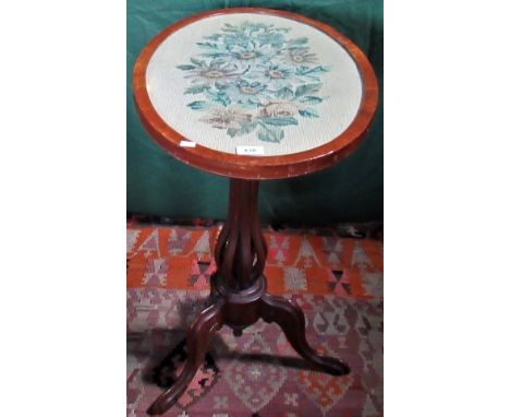 An Edwardian tilt-top table with oval tapestry panel, formerly a pole screen.