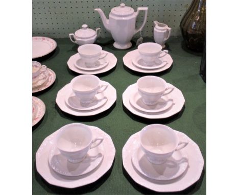 A Rosenthal tea service 'Classic Rose' pattern comprising: six trios, teapot, sugar bowl and milk jug.  