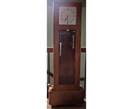 An Art Deco walnut chiming triple weight longcase clock. Condition Report: Overall condition good, no major damage, glass and