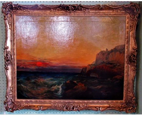 A large 19th century gilt framed oil on canvas seascape, rocky shores at sunset.