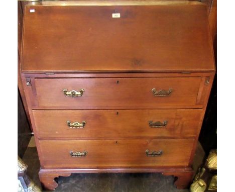 A 19th century mahogany bureau, the fall front opening to reveal fitted interior over three long graduated drawers on ogee br