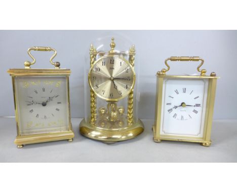 A Koma anniversary clock and two carriage clocks 