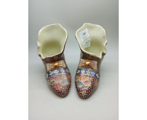 A pair of Oriental decorative ceramic boots 