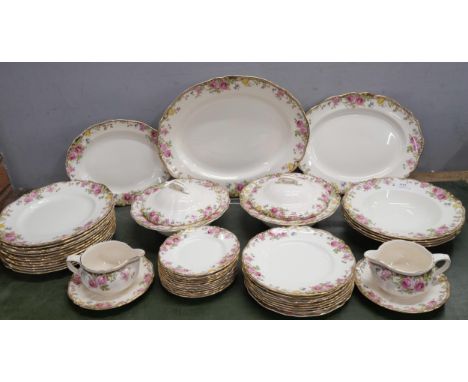 A Royal Doulton dinner service in the English Rose pattern comprising of 44 pieces in total. To include dinner plates, salad 