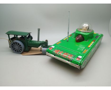 A Tri-ang Minic clockwork model steam engine and a tin-plate 'sparkling' toy tank 