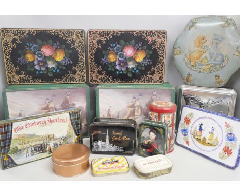 A collection of vintage tins including three with a collection of buttons 