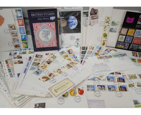 A collection of British stamps, including ten Victorian penny reds, other Victorian British Empire Exhibition, first day cove