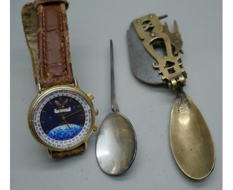 A Roman style utility knife/tool, a Roman style anointing spoon and an Apollo II commemorative watch
