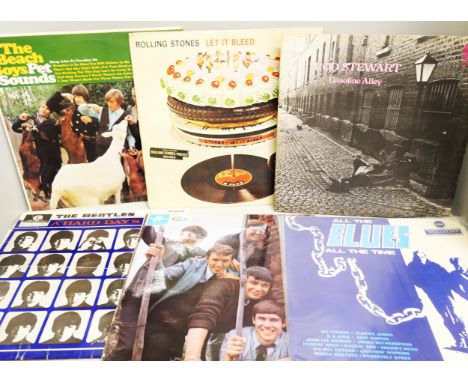Eighteen vinyl LP records, mostly 1960s first pressings