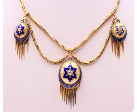 A cased Victorian unmarked gold, diamond and enamel pendant necklace. 37 cm long. 31.9 grammes total weight. 
