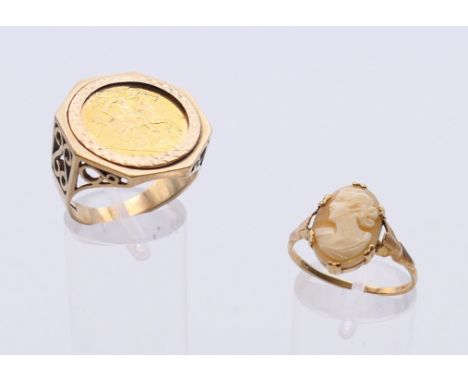 A 9 ct gold cameo ring (ring size 0. 2 grammes total weight) and a 9 ct gold 1982 half sovereign ring (ring size R/S. 8.9 gra