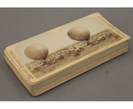 A quantity of Underwood and Underwood stereoscope cards depicting various South African War scenes, including the Balloon Cor